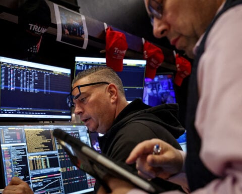 Wall Street ends higher on tech rebound, rising rate cut bets