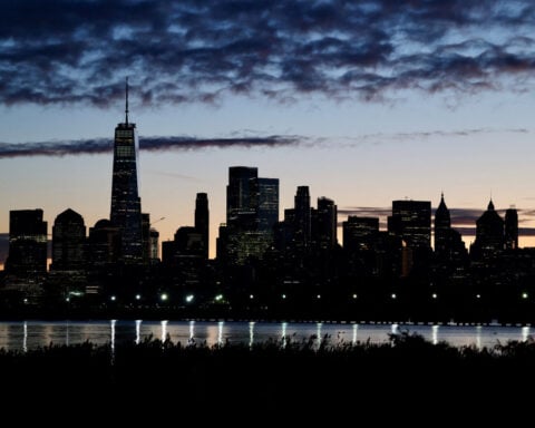 Economists see slightly faster US growth, sticky inflation in 2026