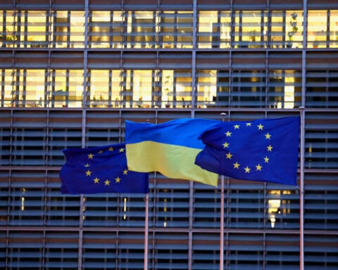EU vows to keep supporting Ukraine with cash and weapons as peace talks continue