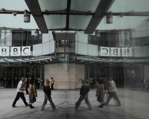 BBC leaders grilled by lawmakers over its standards after Trump threatened to sue