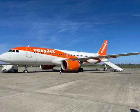 UK's easyJet beats annual profit expectations, lifts target for holidays business