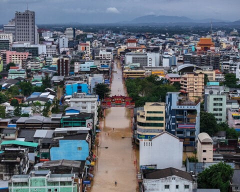‘Once-in-300-years’ rain leaves Thai city flooded and maternity ward stranded