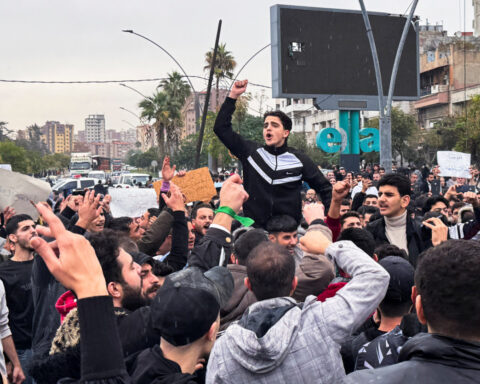 Syrian security forces use gunfire to disperse rival protests in Alawite heartland