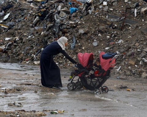 Floods swamp homeless Palestinians' tents in Gaza as winter looms