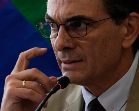 Bolivia's new president plans to scrap taxes and borrow money to confront economic crisis