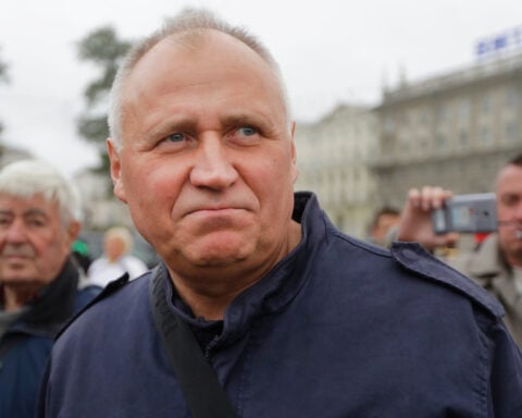 Belarusian politician Mikola Statkevich returned to prison after refusing 'forced deportation'
