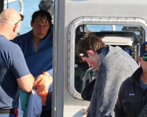 U.S. Coast Guard finds 4 missing boaters alive after their boat capsized