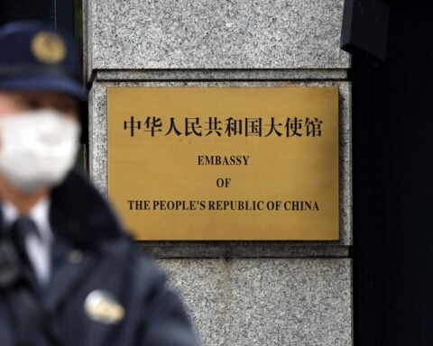 China again cautions citizens against Japan visits