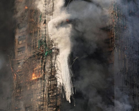 Hong Kong mourns as rescuers comb ruined buildings for bodies following deadly blaze. Here’s what we know