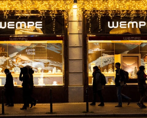 German consumer sentiment brightens modestly as holiday shopping begins