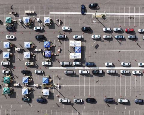 At some food banks, surging demand means a struggle to feed families