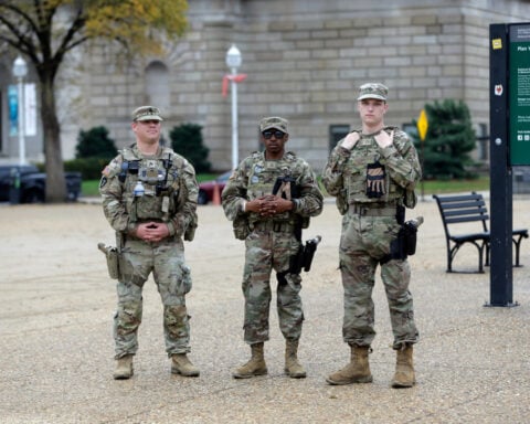 Afghan national charged in Guard ambush shooting drove across US to carry out attack, officials say