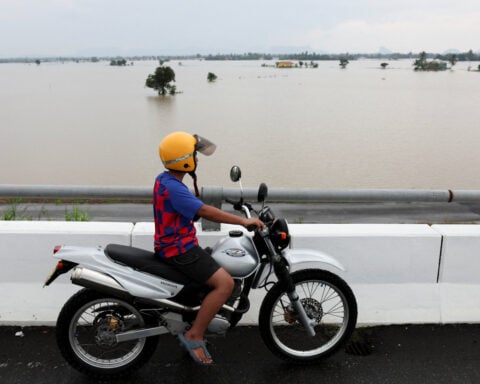 'Like an ocean': Malaysians recall race against rising waters after major flood