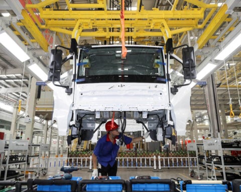 China's factory activity set to shrink for eighth month - Reuters poll