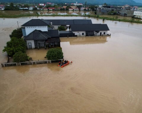 Rescuers step up recovery operations as Southeast Asia flood deaths reach 321