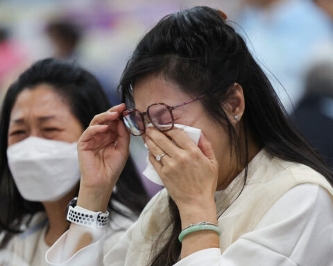Hong Kong tower fire toll rises to 128, more arrests made