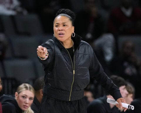 Harmon's last-second basket lifts No. 4 Texas women over No. 2 South Carolina for Players Era title