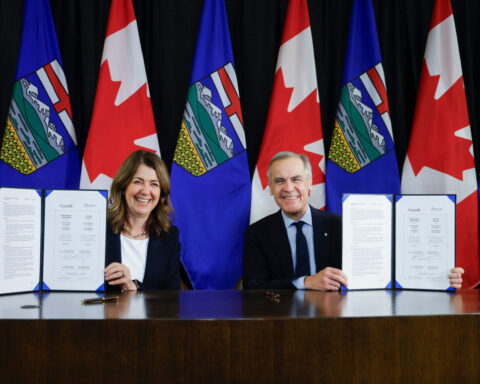 Canada's prime minister and Alberta's premier sign pipeline deal that could reverse oil tanker ban