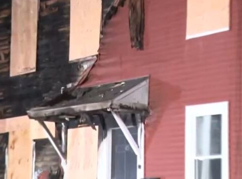 Utility worker credited with rescuing resident from burning row home