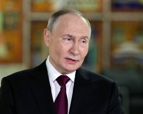Russia's Putin says output fall in some sectors not acceptable