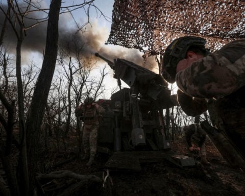 The message behind Putin’s camouflage-clad claim of victory in a key Ukrainian city