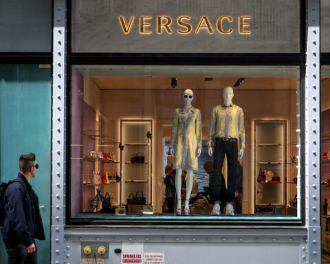 After long courtship, Versace becomes part of Prada