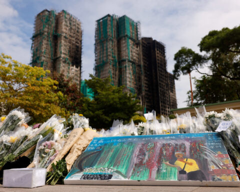Hong Kong orders judge-led inquiry into fire that killed 156