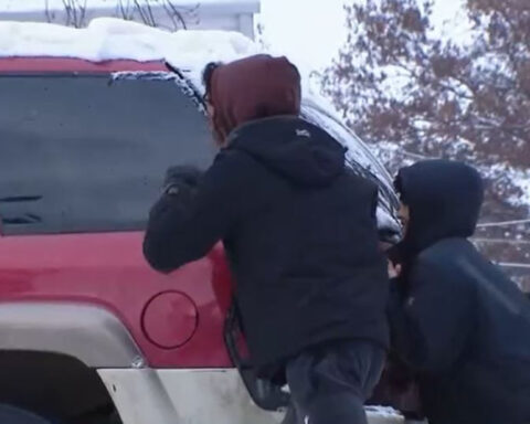 Brothers help push cars out of pile-up caused by winter storm