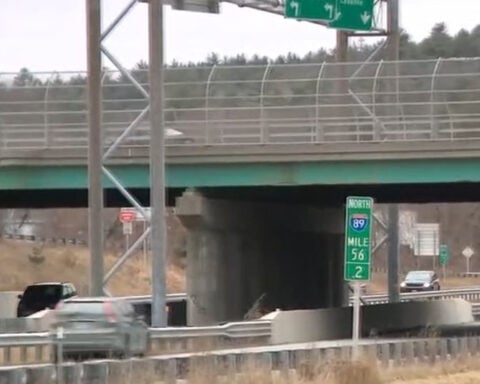 Woman's car hit by piece of Route 120 bridge