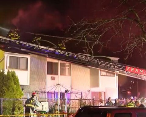 Two rescued, firefighter injured in apartment fire