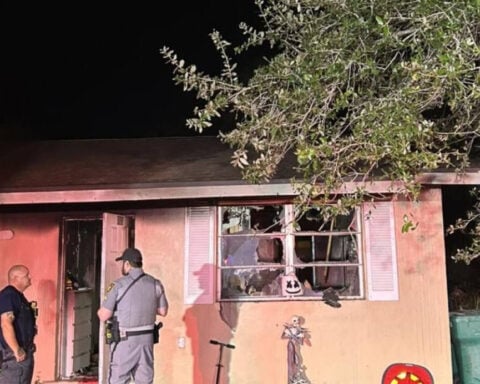 Neighbor helps resident escape duplex fire through bedroom window