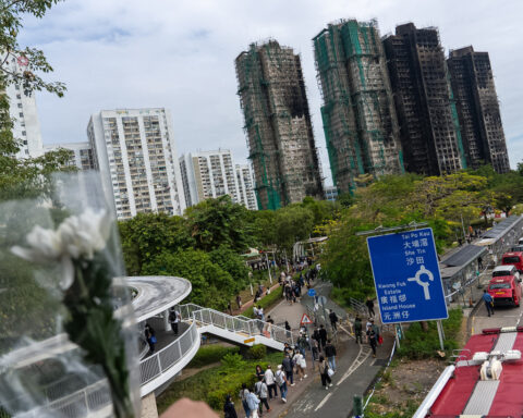 Hong Kong fire probe reveals unsafe netting as public mourns and government stifles dissent