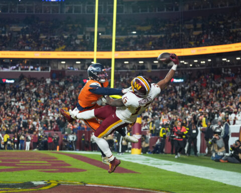 Catch of the year? Commanders' Treylon Burks makes incredible 1-handed TD grab vs. Broncos