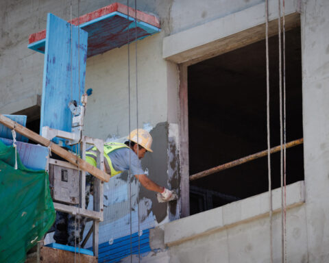 China's November new home prices climb but resale values extend declines, survey shows