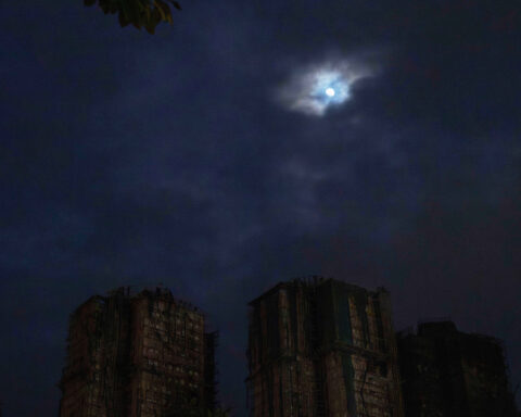 Hong Kong leader says fire investigation 'must uncover the truth' and promises construction reforms