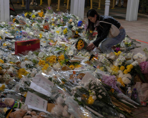 Death toll in Hong Kong apartment complex blaze rises to 146 as the city mourns