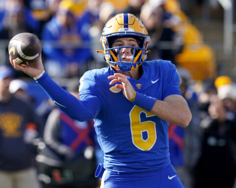 No. 13 Miami races past No. 24 Pitt 38-7 to state its case for a CFP berth