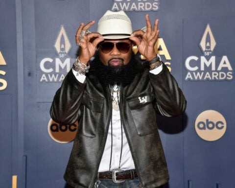 AI country hit 'Walk My Walk' built on Blanco Brown's sound sparks questions of attribution, ethics