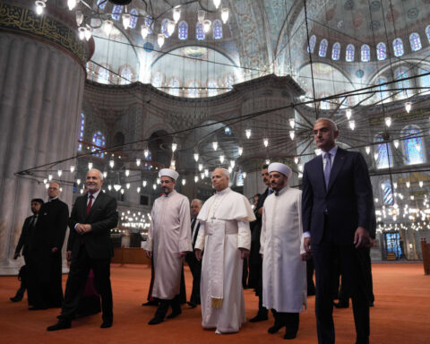 Pope Leo removes shoes but does not appear to pray in first mosque visit