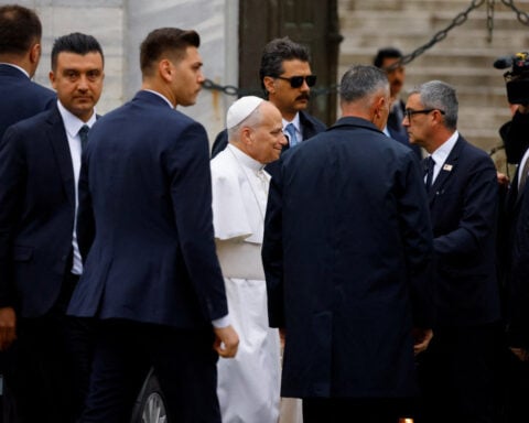 Pope removes shoes but doesn't pray on visit to Istanbul's Blue Mosque