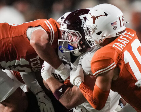 Texas A&M's perfect season spoiled by rival Texas, but playoffs await for the Aggies