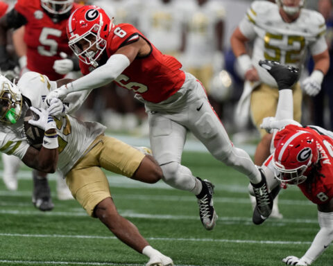 No. 4 Georgia holds off No. 23 Georgia Tech 16-9 for 8th straight win in series