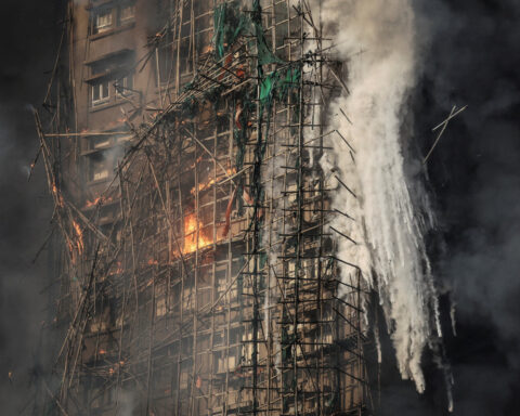 The photo that became a symbol for Hong Kong's deadly fire