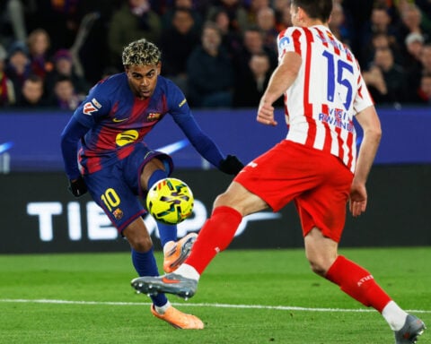 Dani Olmo scores and gets injured as Barcelona beats Atletico Madrid 3-1