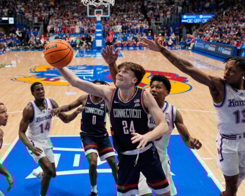 Braylon Mullins' breakout performance lifts No. 5 UConn over No. 21 Kansas 61-56 at Allen Fieldhouse