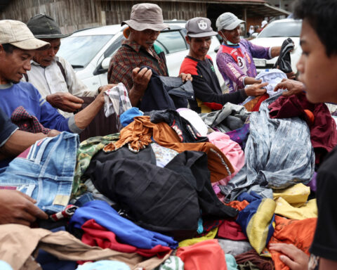 Flood-hit Indonesian regions run low on fuel, funds for relief effort