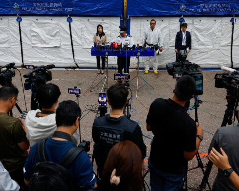 Hong Kong apartment fire toll hits 159, infant among dead