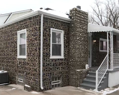 Historic house made from 20,000 glass bottles hits the market