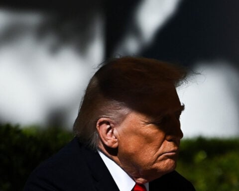 With Trump’s focus abroad, Republicans push for midterms pivot to economy