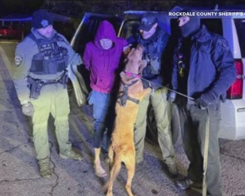 Escaped inmate taken into custody after knocking on doors